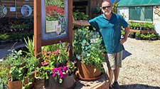 Spiral Garden owner with display plants